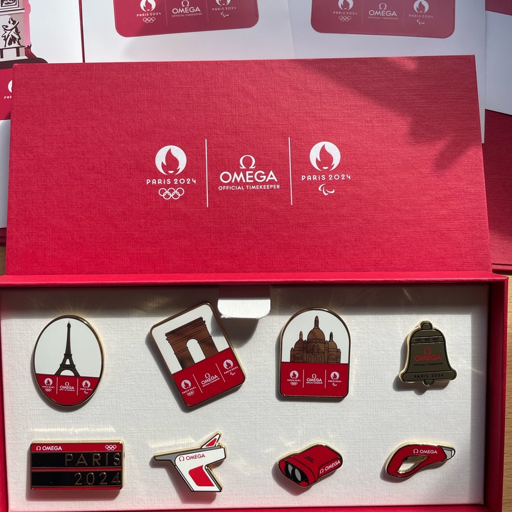 Omega 2024 Paris Olympics Pins Stickers and Bag